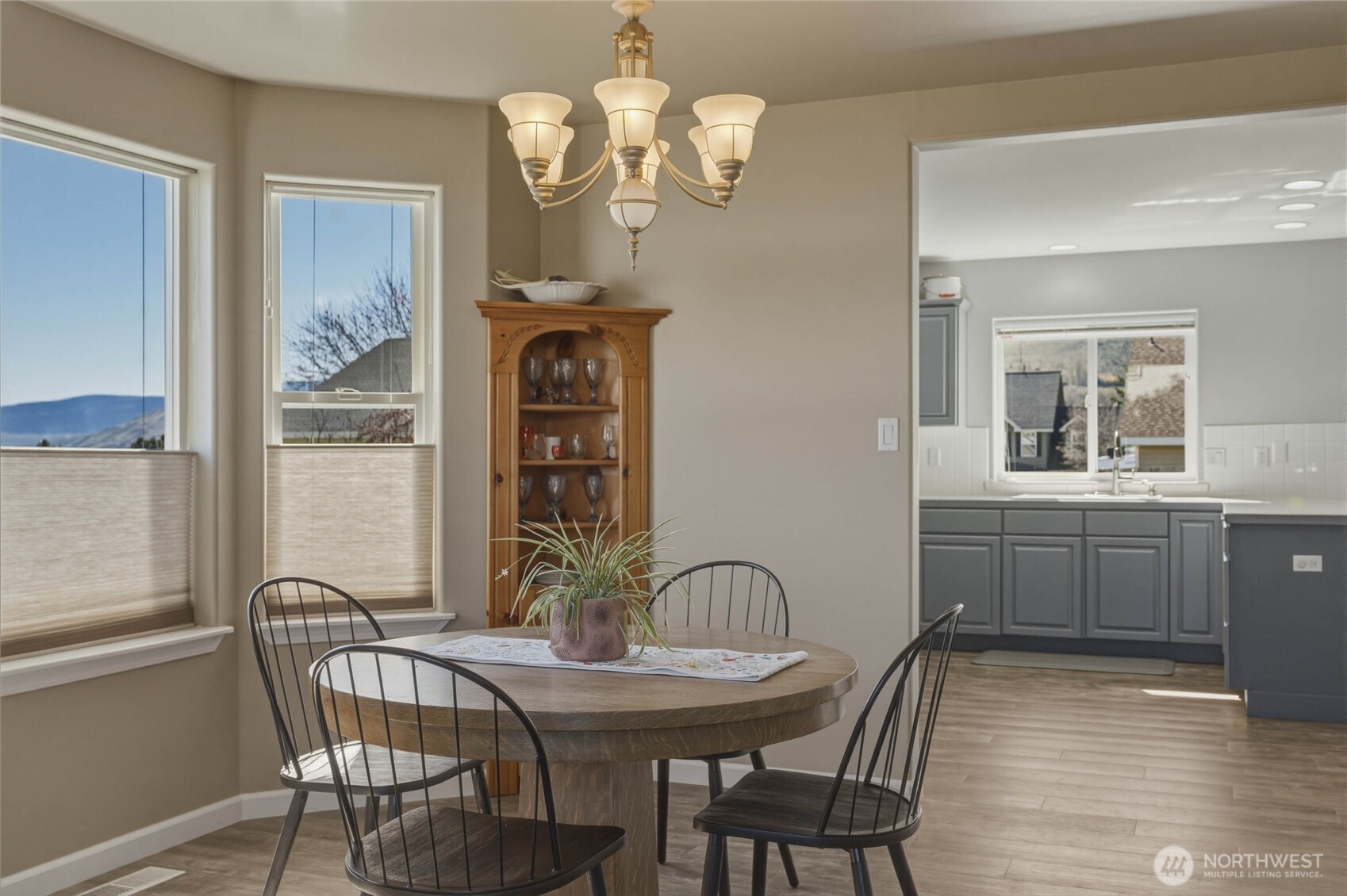 2217 Michael Brooke Wenatchee, WA 98801 - Photo 14 of 37 a view of a dining room with furniture wooden floor and chandelier