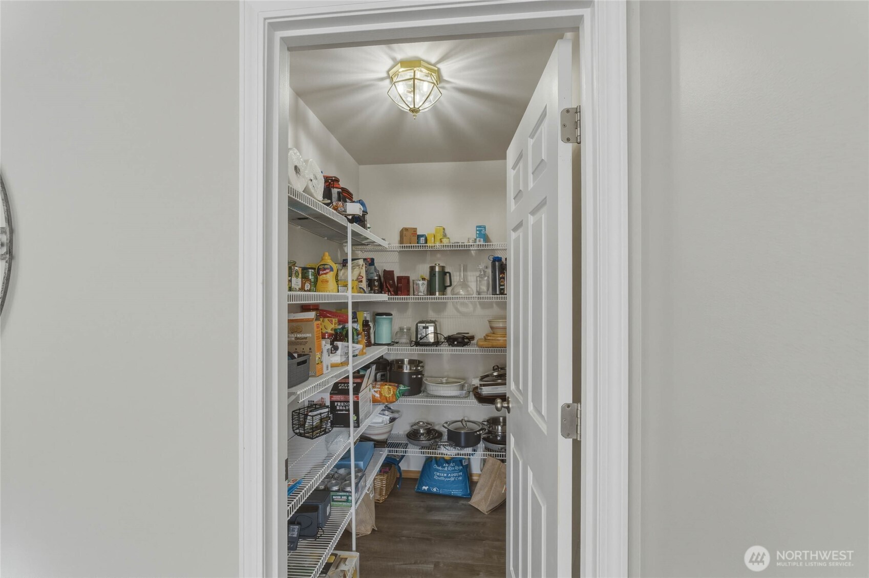 2217 Michael Brooke Wenatchee, WA 98801 - Photo 18 of 37 a view of a hallway with shelves