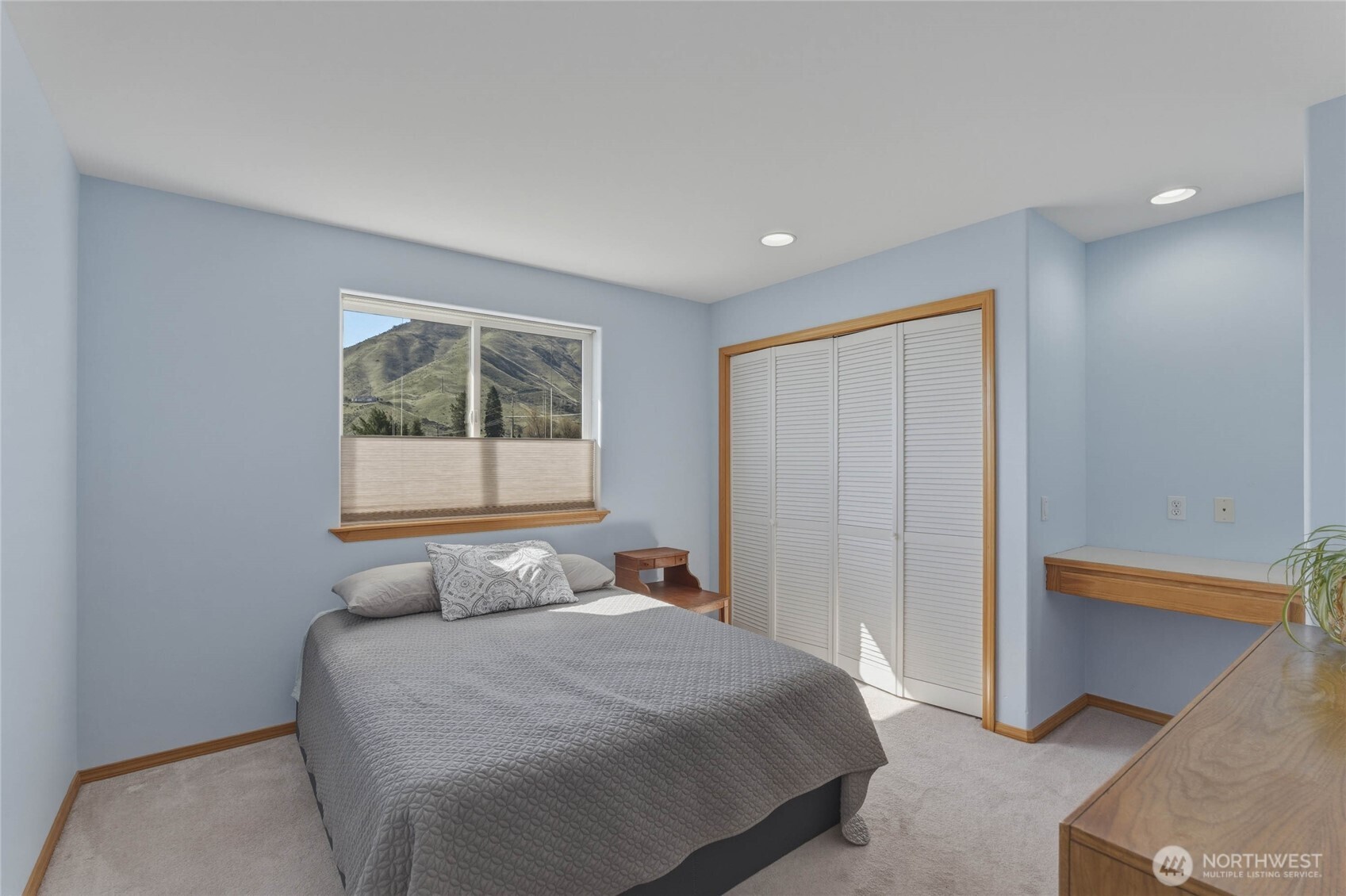 2217 Michael Brooke Wenatchee, WA 98801 - Photo 22 of 37 a bedroom with a bed and a window