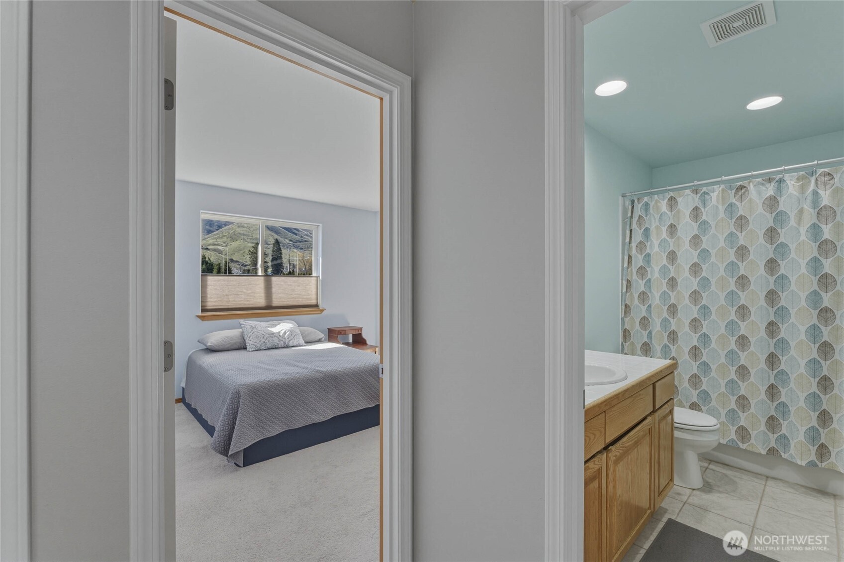 2217 Michael Brooke Wenatchee, WA 98801 - Photo 23 of 37 a bedroom with a bed and a window