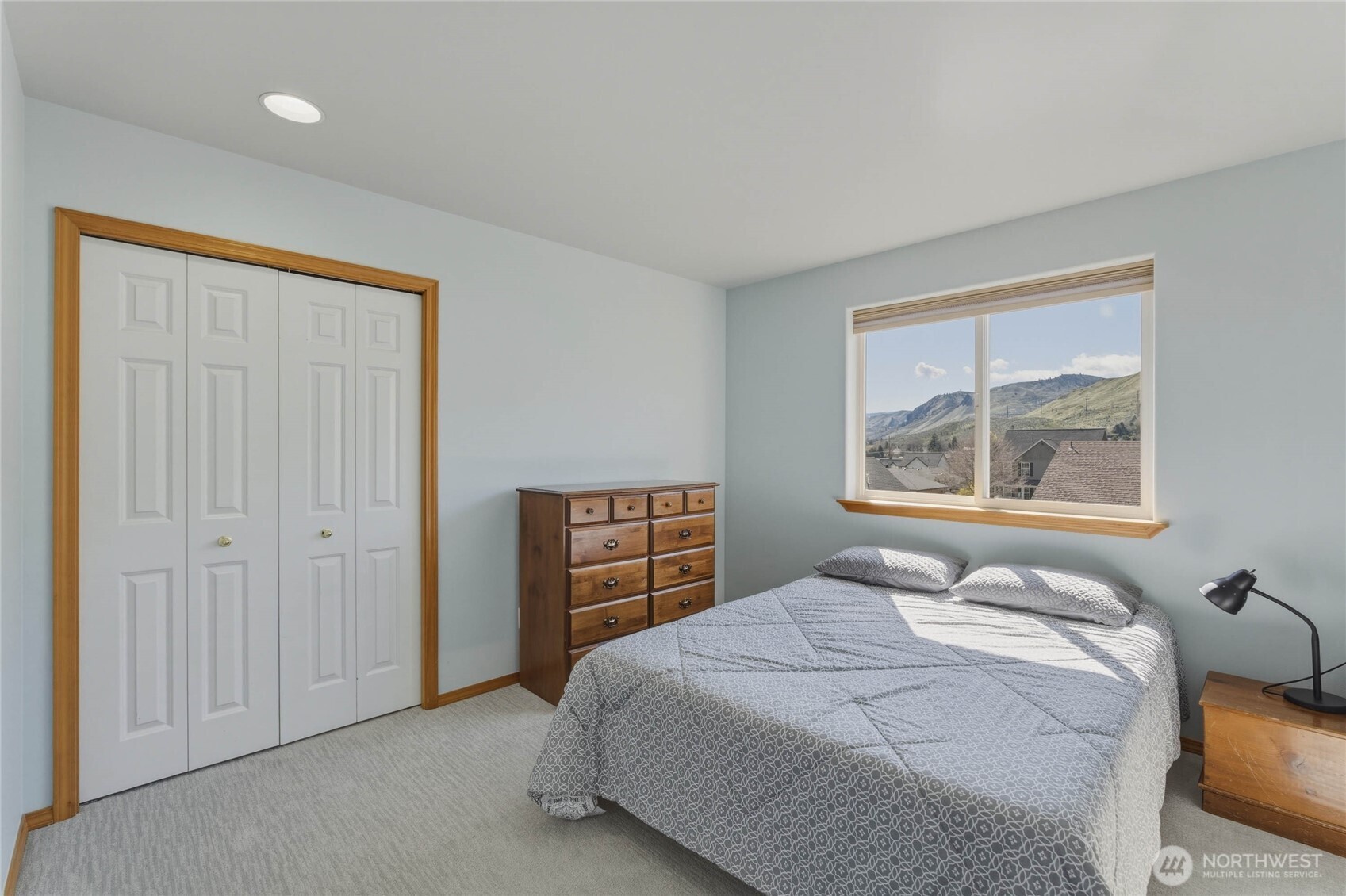 2217 Michael Brooke Wenatchee, WA 98801 - Photo 24 of 37 a bedroom with a bed and a window