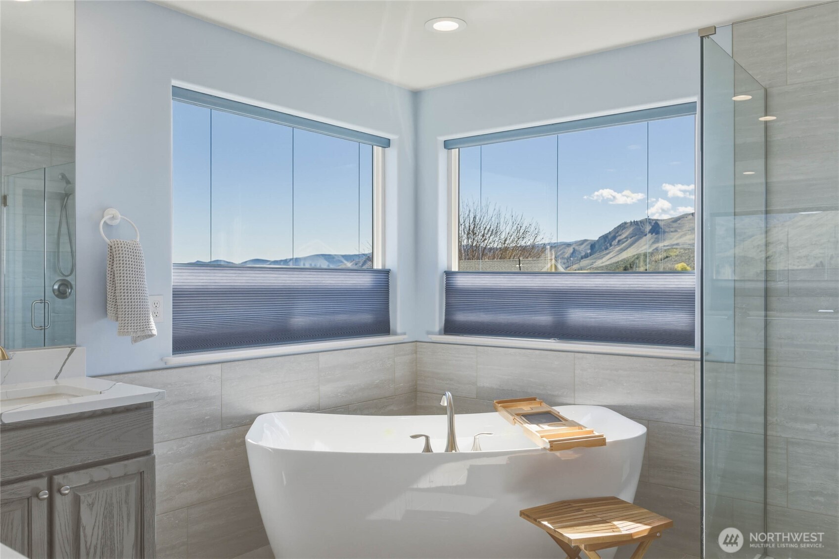 2217 Michael Brooke Wenatchee, WA 98801 - Photo 27 of 37 a white bath tub sitting in a bathroom