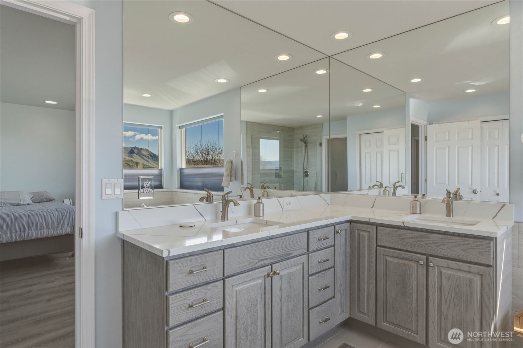2217 Michael Brooke Wenatchee, WA 98801 - Photo 31 of 37 a bathroom with a double vanity sink and a mirror