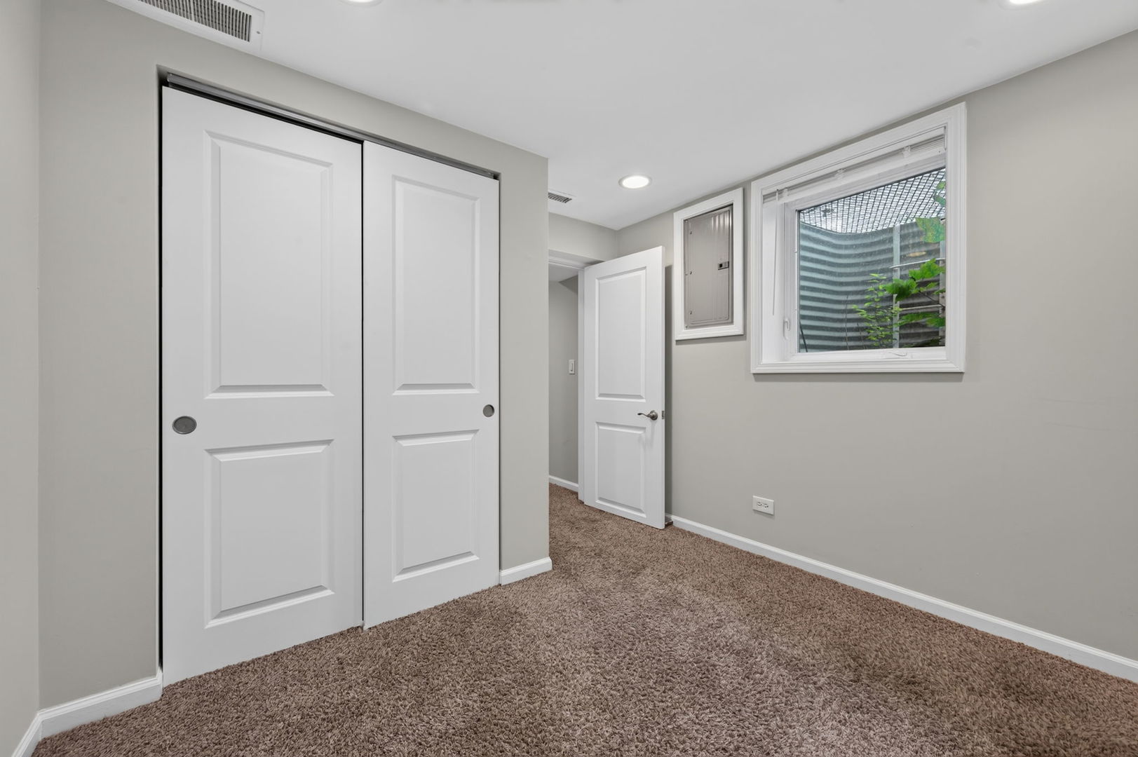 415 Alma Terrace Cary, IL 60013 - Photo 17 of 23 a view of an empty room with closet and a window