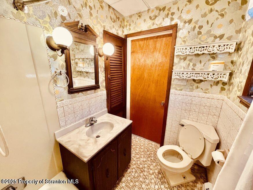 1630 Myrtle Street, Unit 1 Scranton, PA 18510 - Photo 18 of 25 a bathroom with a sink toilet and shower