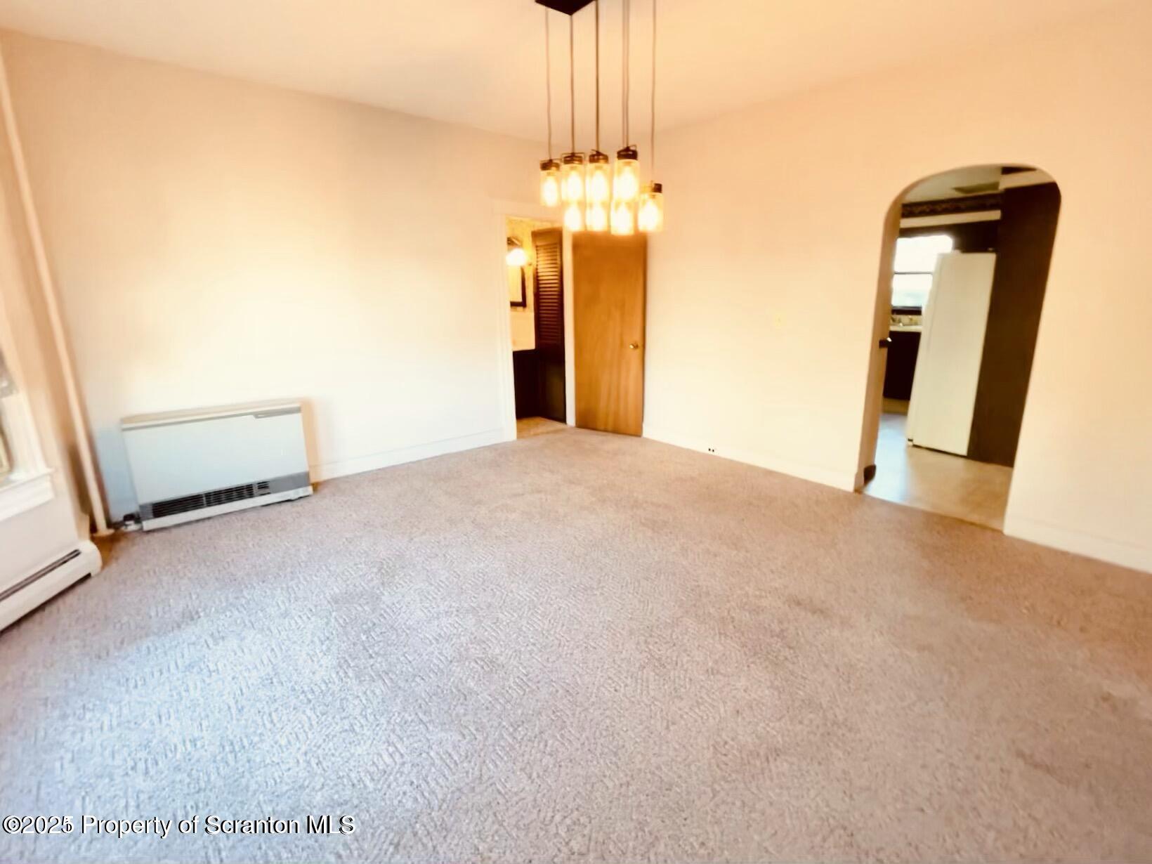 1630 Myrtle Street, Unit 1 Scranton, PA 18510 - Photo 19 of 25 a view of empty room with wooden floor