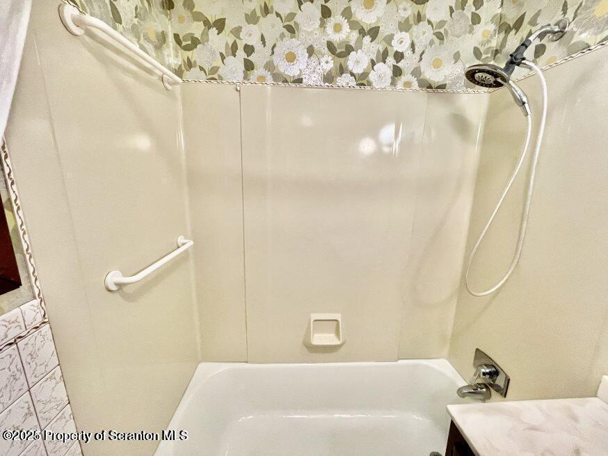 1630 Myrtle Street, Unit 1 Scranton, PA 18510 - Photo 7 of 25 a bathroom with a bathtub and shower