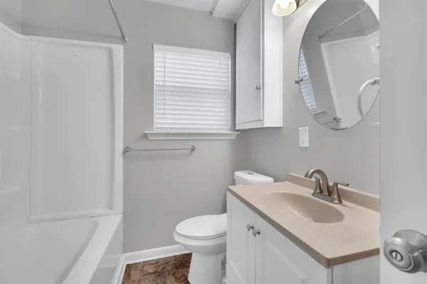 a bathroom with a sink and a toilet