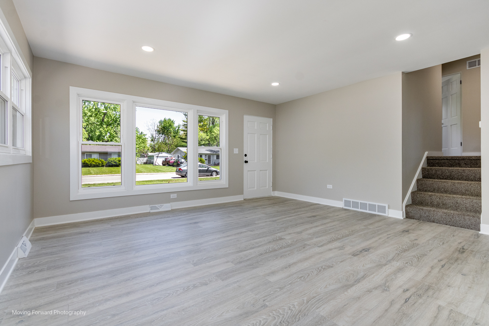 11 Durango Road Montgomery, IL 60538 - Photo 13 of 36 a view of an empty room with wooden floor and a window
