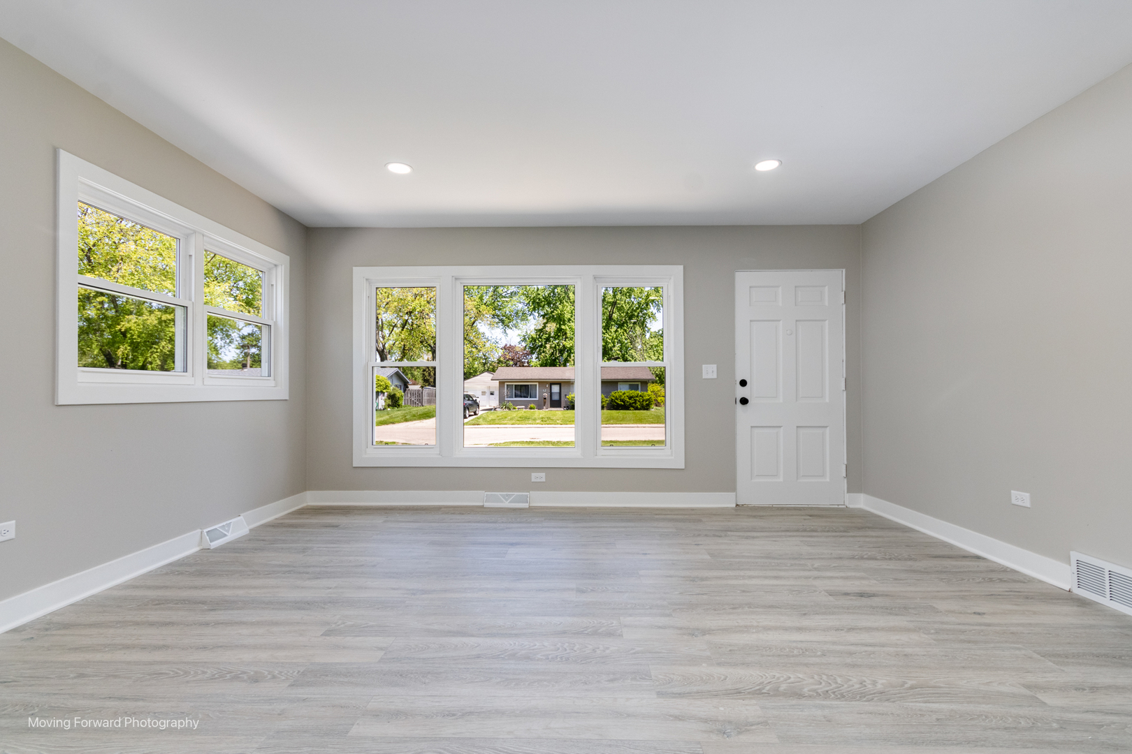 11 Durango Road Montgomery, IL 60538 - Photo 15 of 36 a view of an empty room with wooden floor and a window