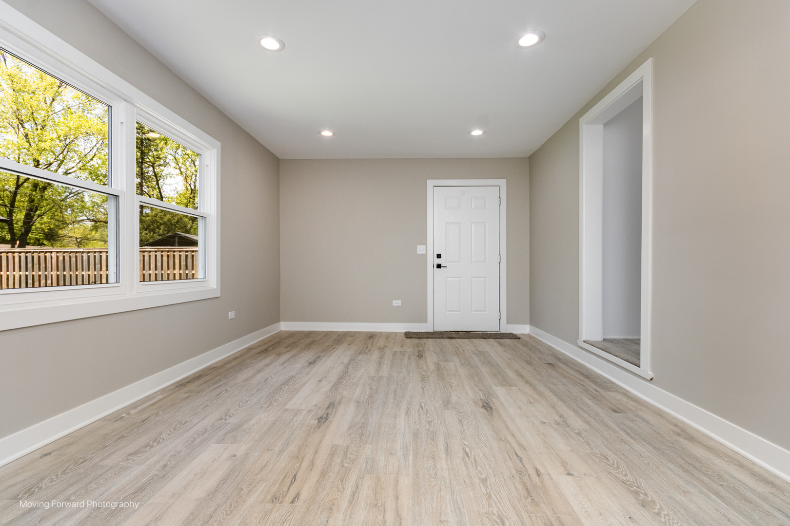 11 Durango Road Montgomery, IL 60538 - Photo 16 of 36 a view of an empty room with wooden floor and a window
