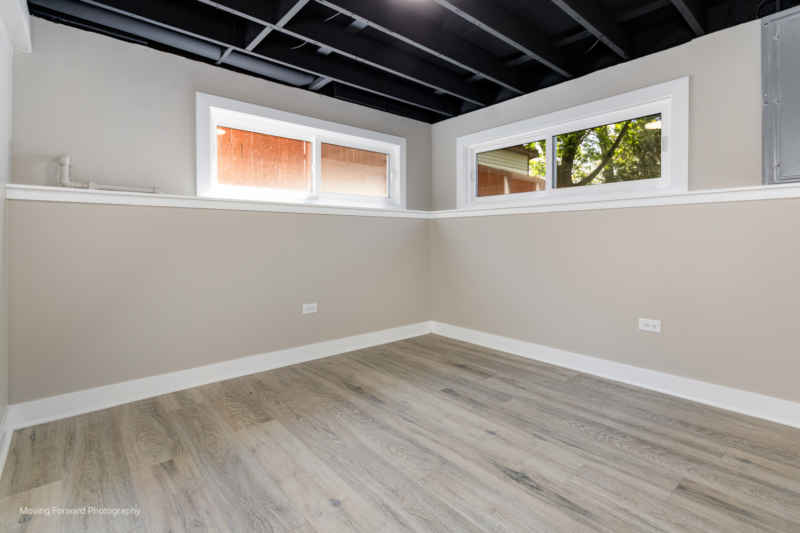 11 Durango Road Montgomery, IL 60538 - Photo 29 of 36 a view of an empty room with wooden floor and a window