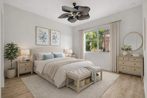 a bedroom with a bed and a dresser