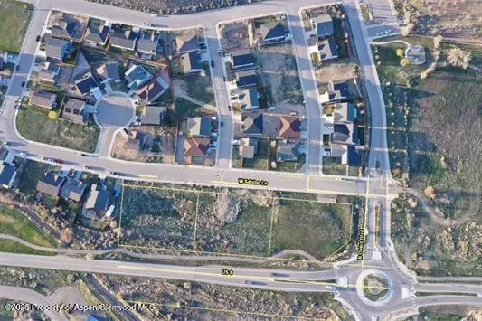 a view of a houses with a yard