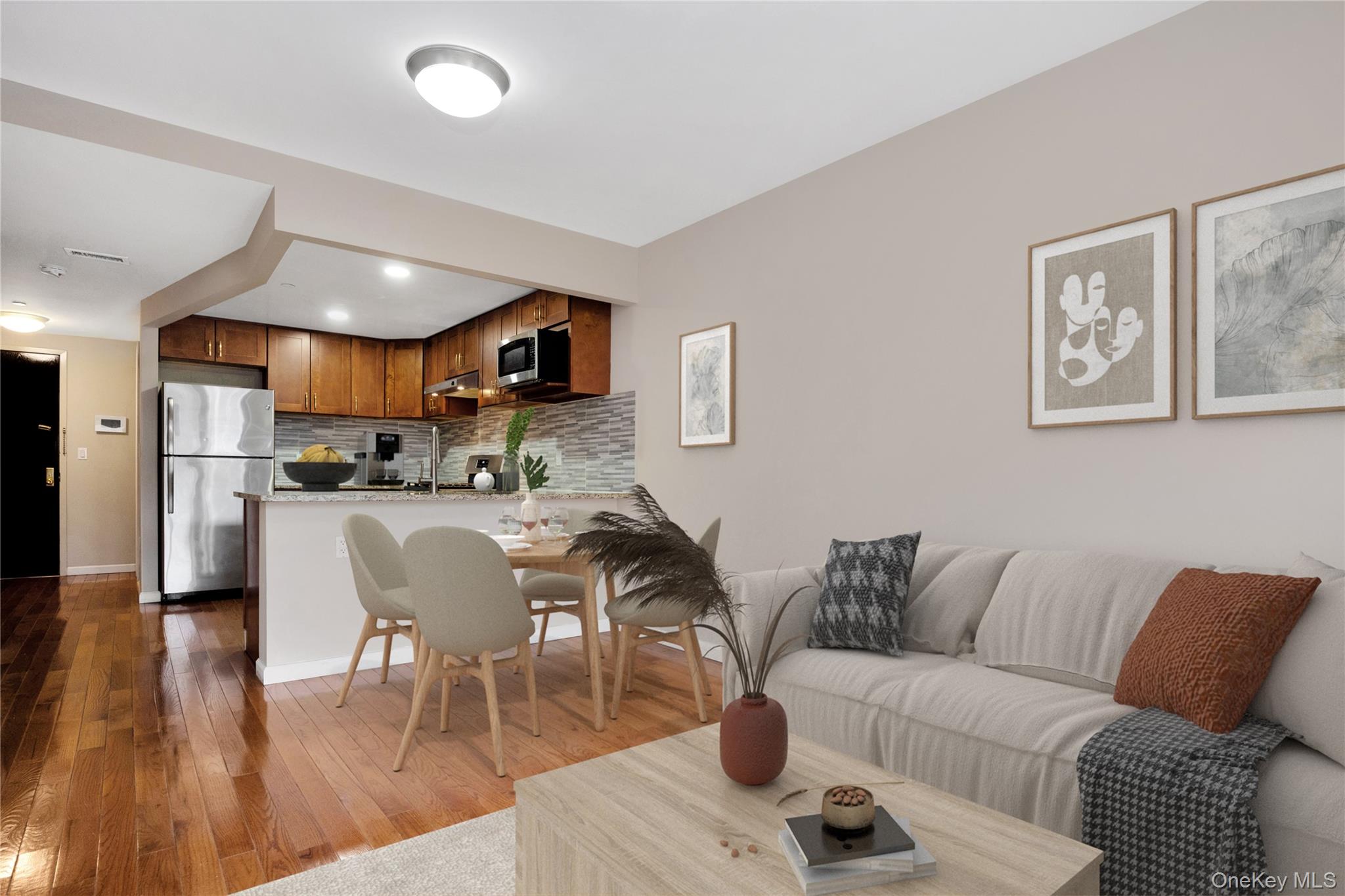 172-18 Jamaica Avenue, Unit 501 Queens, NY 11432 - Photo 5 of 27 a living room with furniture and kitchen view