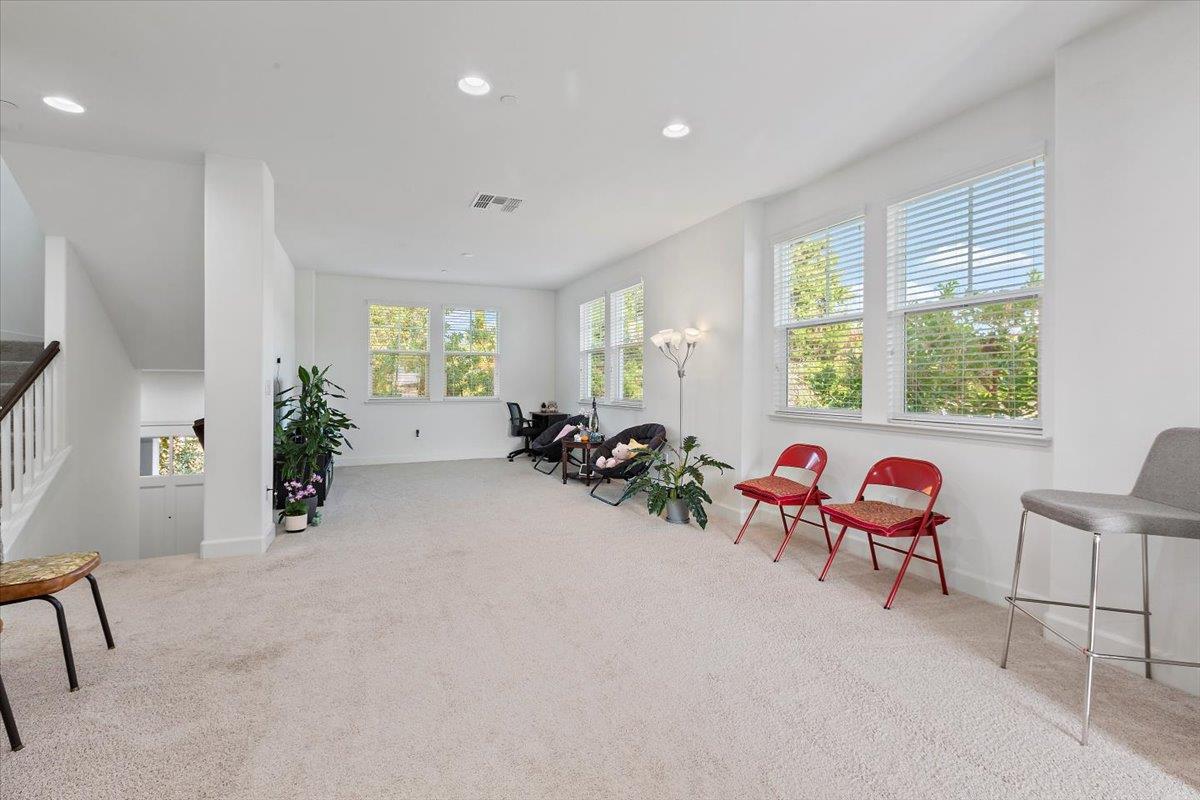 2041 Atlas Loop Mountain View, CA 94043 - Photo 13 of 50 a living room with furniture and windows