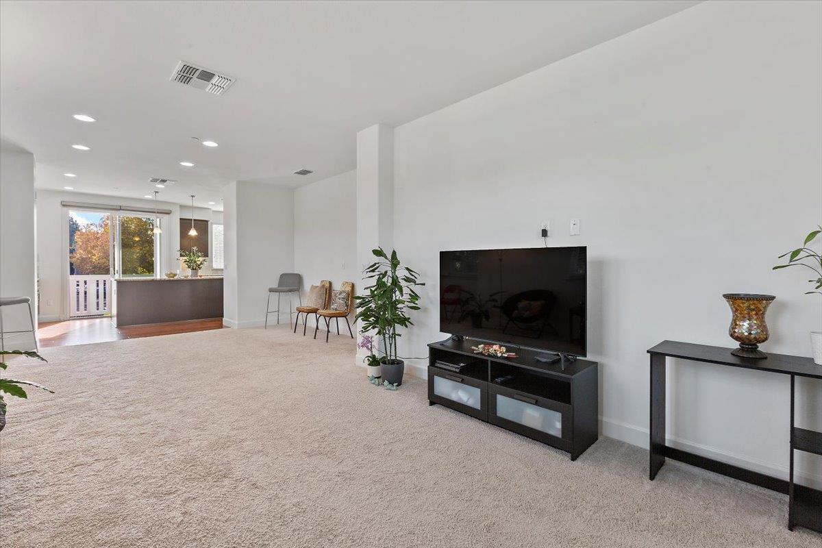2041 Atlas Loop Mountain View, CA 94043 - Photo 20 of 51 a living room with furniture and a flat screen tv