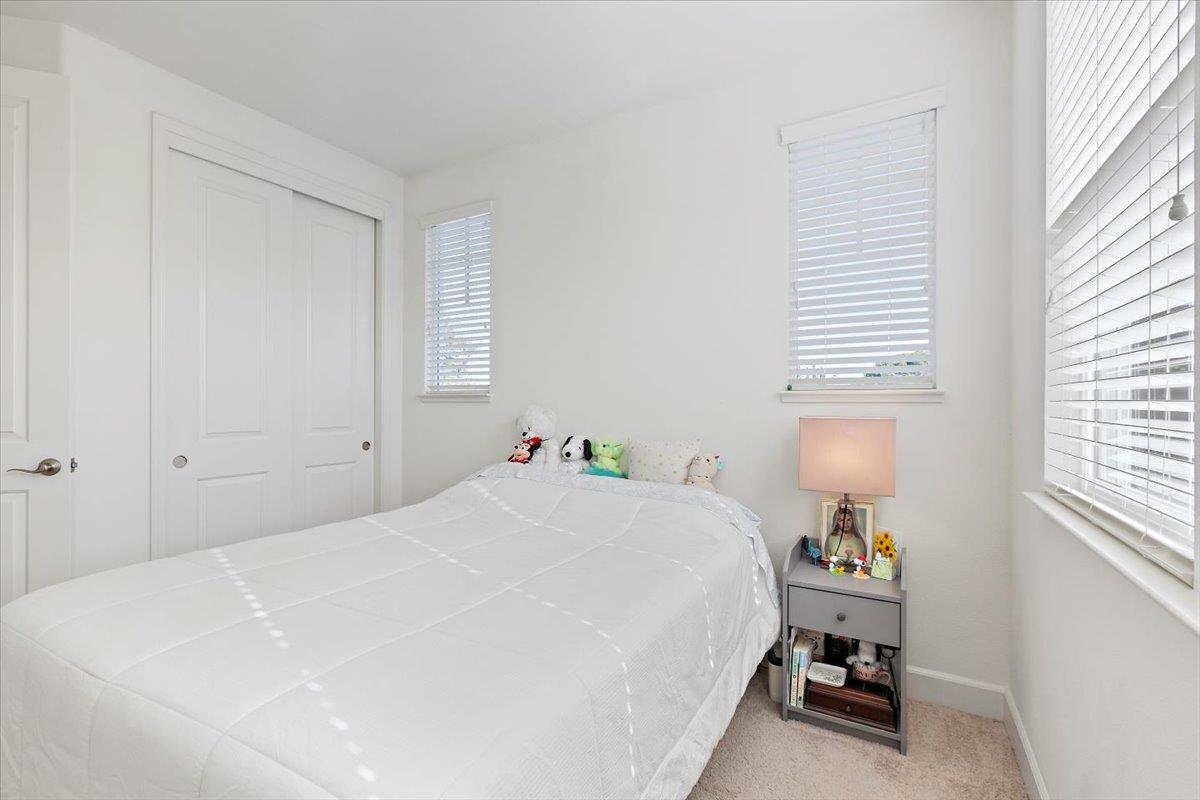 2041 Atlas Loop Mountain View, CA 94043 - Photo 28 of 51 a bedroom with a bed and a window