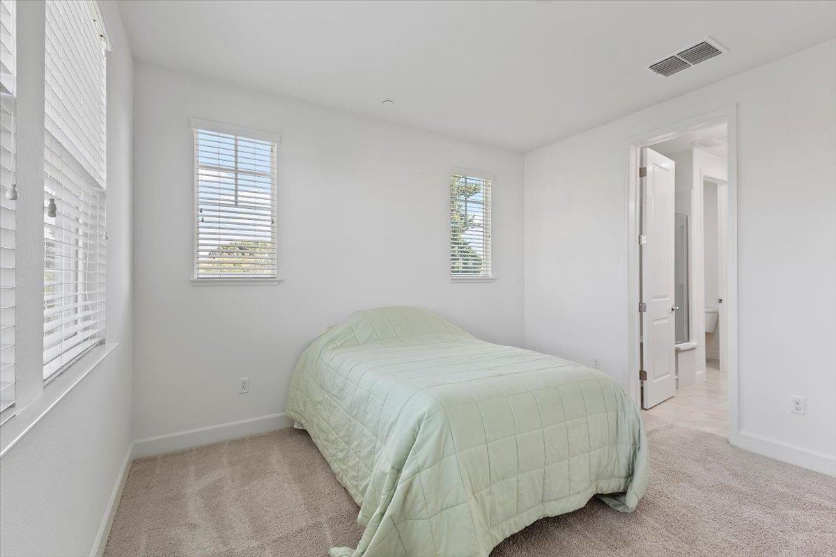 2041 Atlas Loop Mountain View, CA 94043 - Photo 33 of 51 a bedroom with a bed and a window