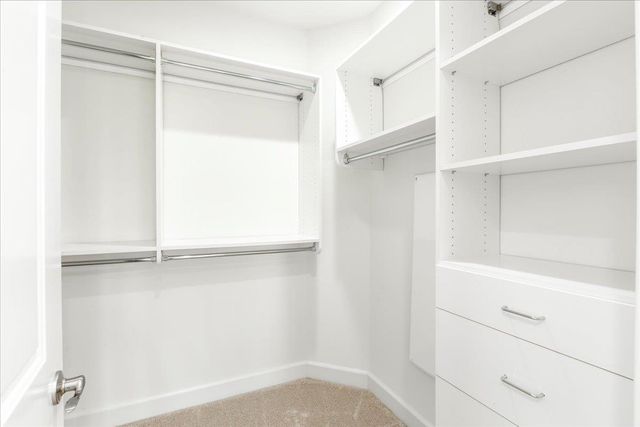 a view of an empty walk in closet