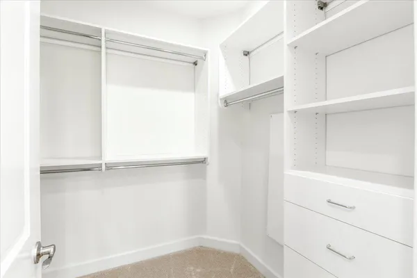 a view of an empty walk in closet