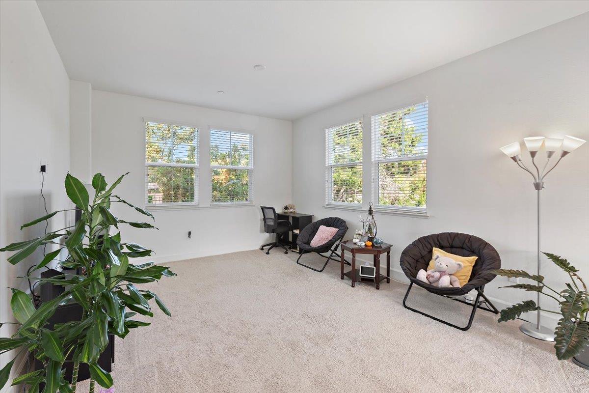 2041 Atlas Loop Mountain View, CA 94043 - Photo 8 of 50 a living room with furniture flowerpot and window