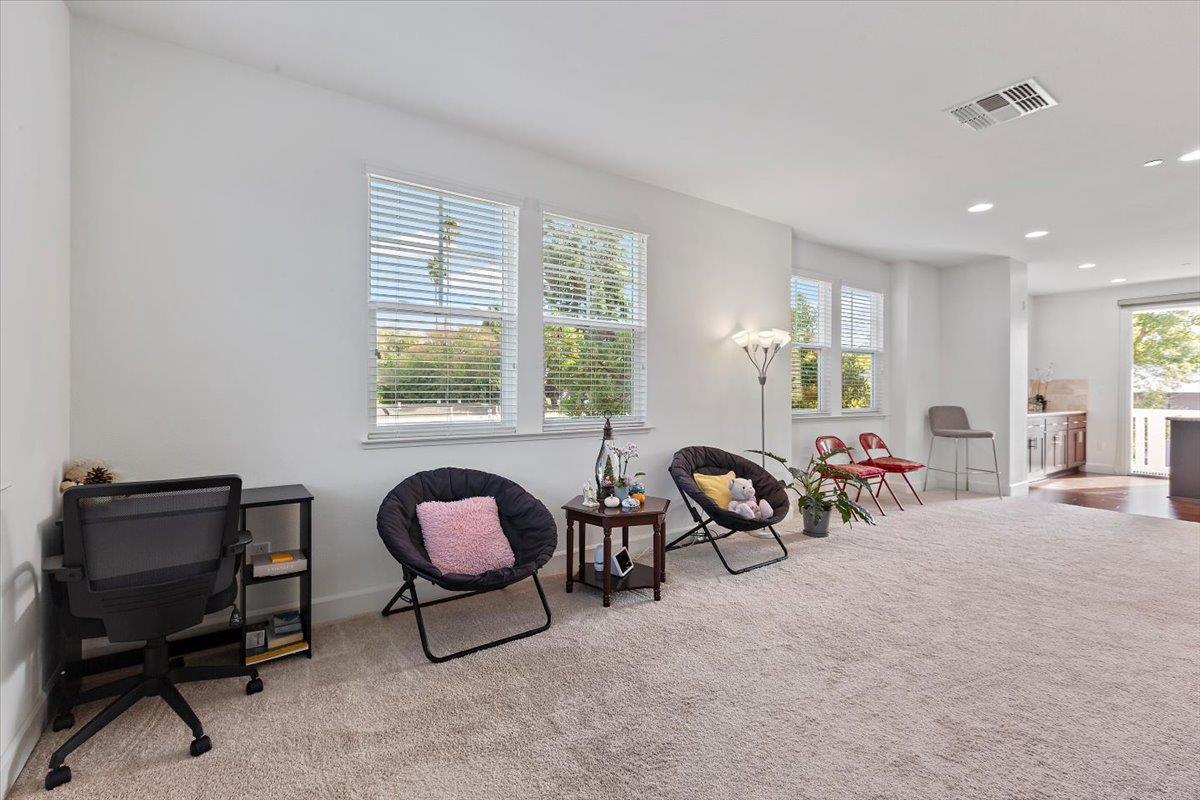 2041 Atlas Loop Mountain View, CA 94043 - Photo 10 of 50 a view of a livingroom with furniture and windows