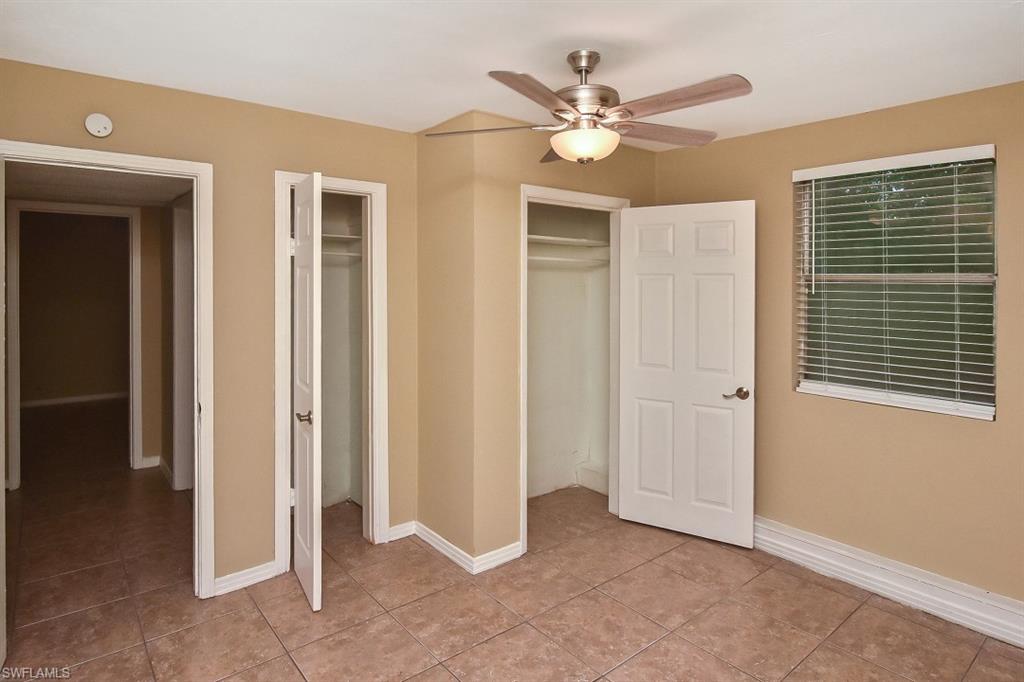 3966 Madison Avenue Fort Myers, FL 33916 - Photo 13 of 22 a view of a livingroom with a chandelier fan