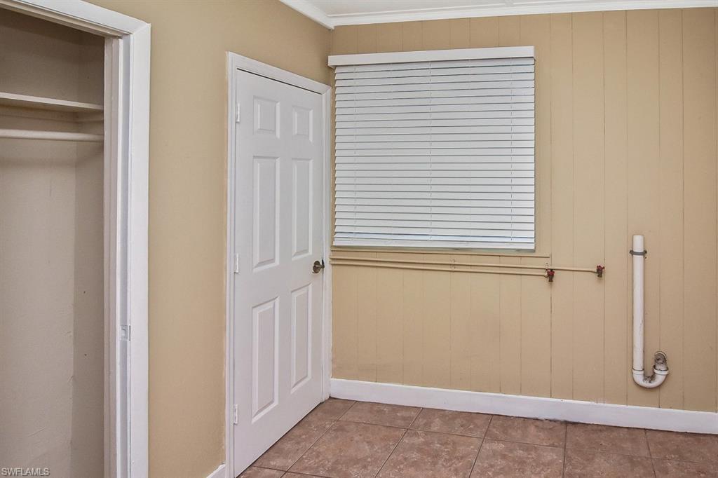 3966 Madison Avenue Fort Myers, FL 33916 - Photo 18 of 22 a view of a livingroom with an empty space