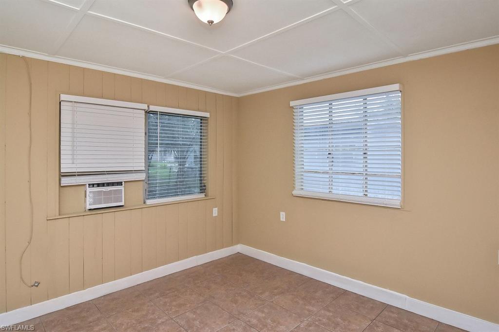 3966 Madison Avenue Fort Myers, FL 33916 - Photo 21 of 22 an empty room with a window
