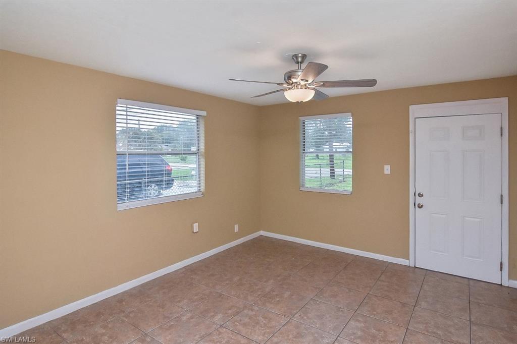 3966 Madison Avenue Fort Myers, FL 33916 - Photo 4 of 22 a view of an empty room with a window