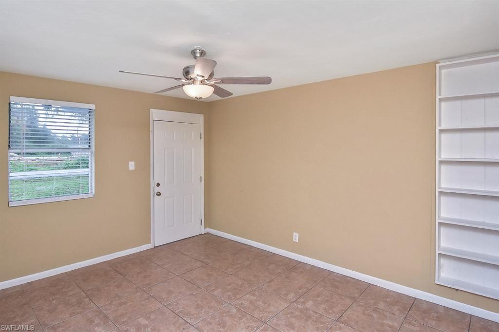 3966 Madison Avenue Fort Myers, FL 33916 - Photo 5 of 22 a view of an empty room with a window