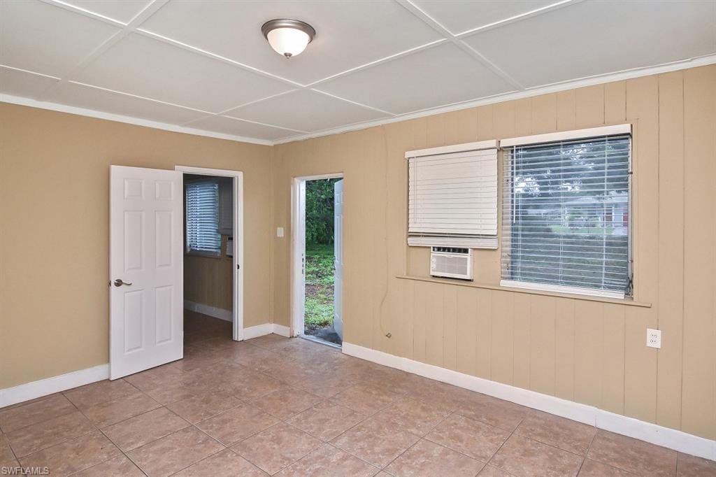 3966 Madison Avenue Fort Myers, FL 33916 - Photo 7 of 22 an empty room with windows