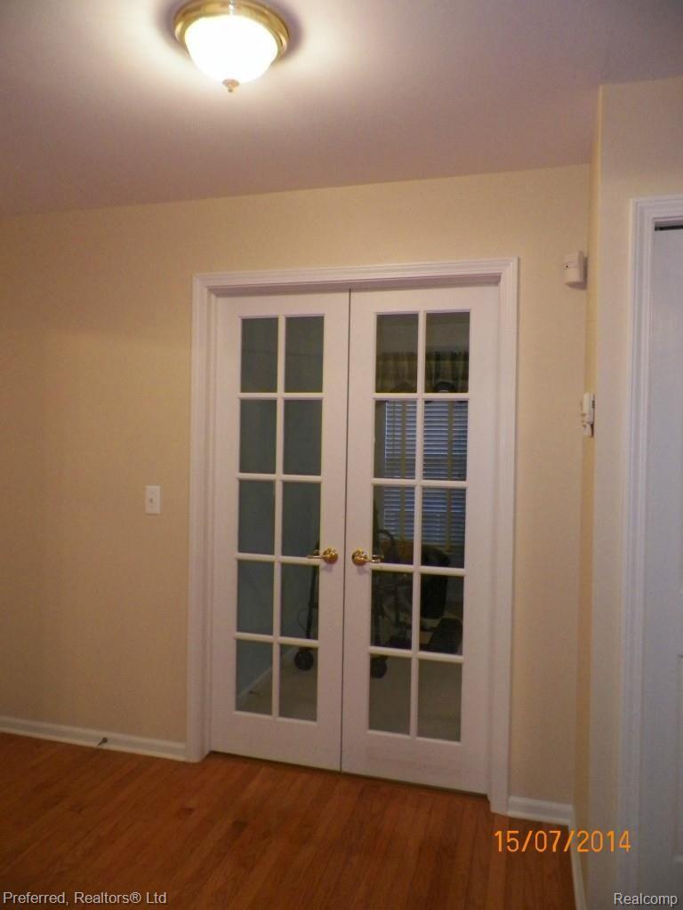 461 Cherry Grove Road, Unit 70 Canton, MI 48188 - Photo 8 of 20 "Glass Panel" Double Door Entry to 1ST Floor Library!