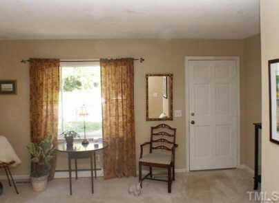 1105 Terrace Court Raleigh, NC 27615 - Photo 5 of 12 a view of a room with entryway wooden floor and windows