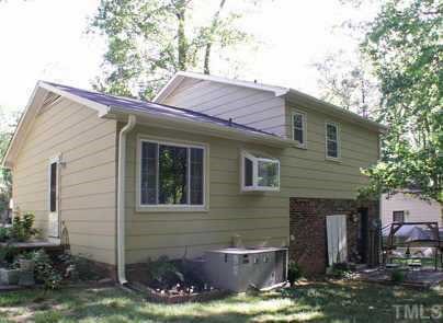 1105 Terrace Court Raleigh, NC 27615 - Photo 10 of 12 a view of a house with a yard