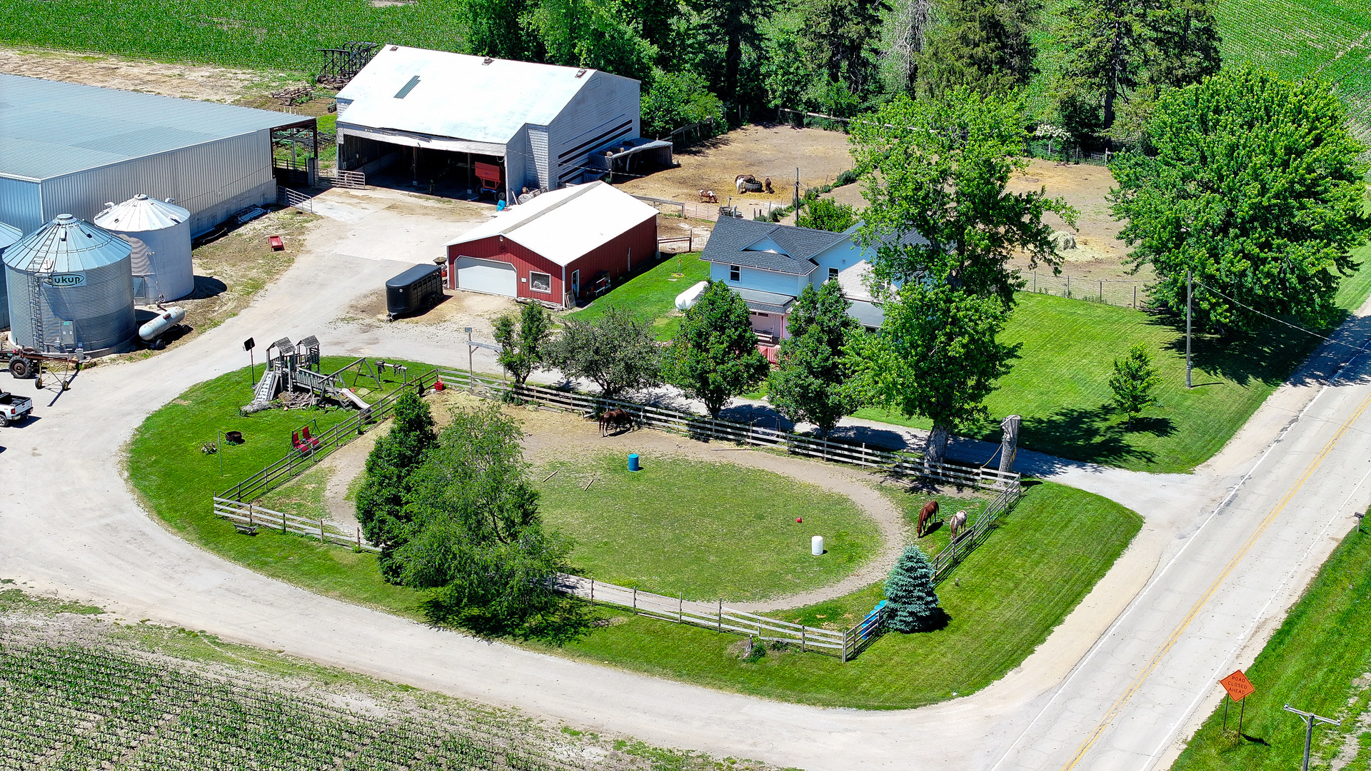 21343 Freeport Road Sterling, IL 61081 - Photo 35 of 41 an aerial view of a house with a garden and swimming pool