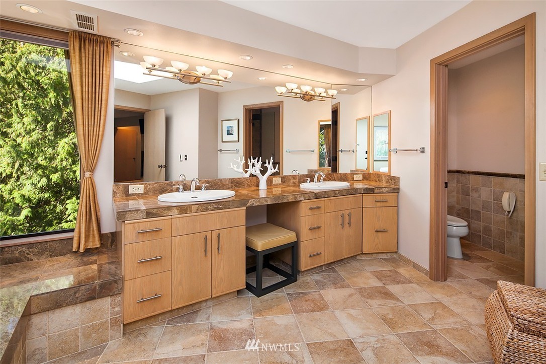 4453 East Mercer Way Mercer Island, WA 98040 - Photo 14 of 25 a room with a sink and cabinets