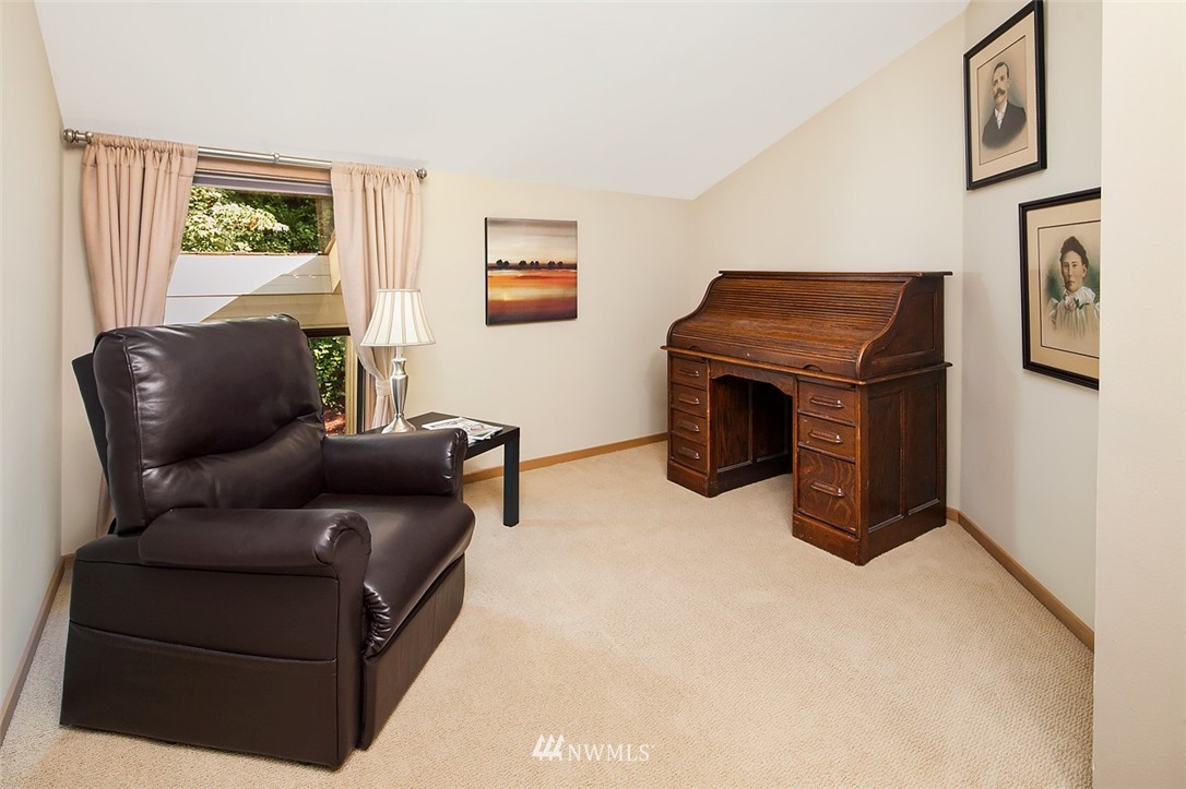 4453 East Mercer Way Mercer Island, WA 98040 - Photo 17 of 25 a living room with furniture and a fireplace