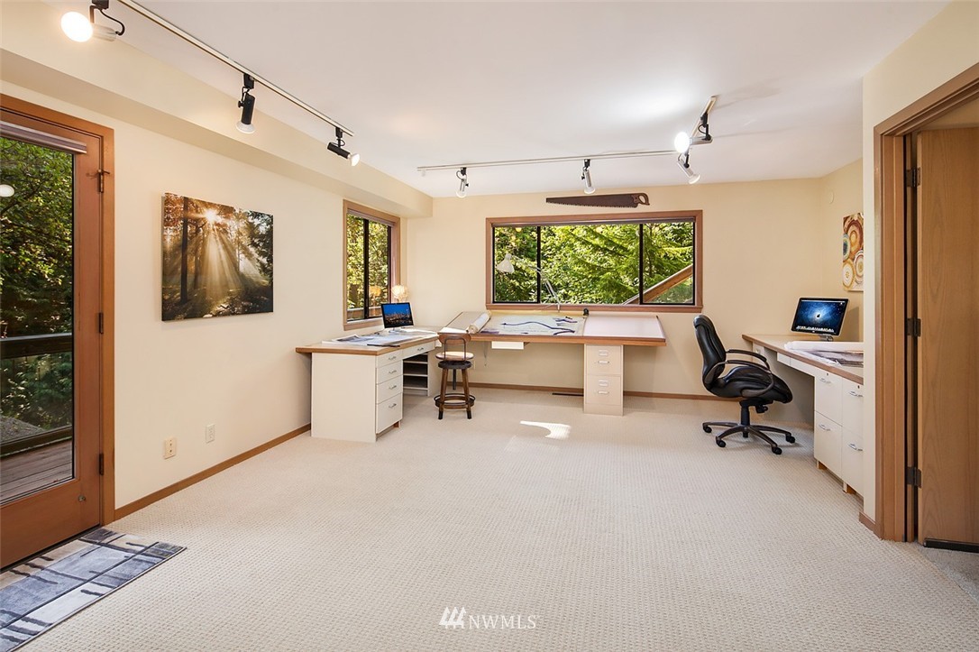 4453 East Mercer Way Mercer Island, WA 98040 - Photo 21 of 25 a view of a livingroom with workspace and a window