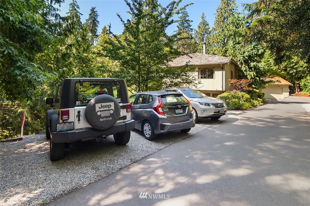 4453 East Mercer Way Mercer Island, WA 98040 - Photo 25 of 25 a front view of a house with car parked