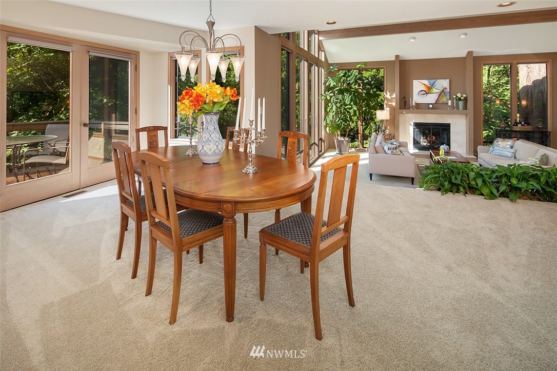 4453 East Mercer Way Mercer Island, WA 98040 - Photo 6 of 25 a view of a dining room with furniture window and outside view