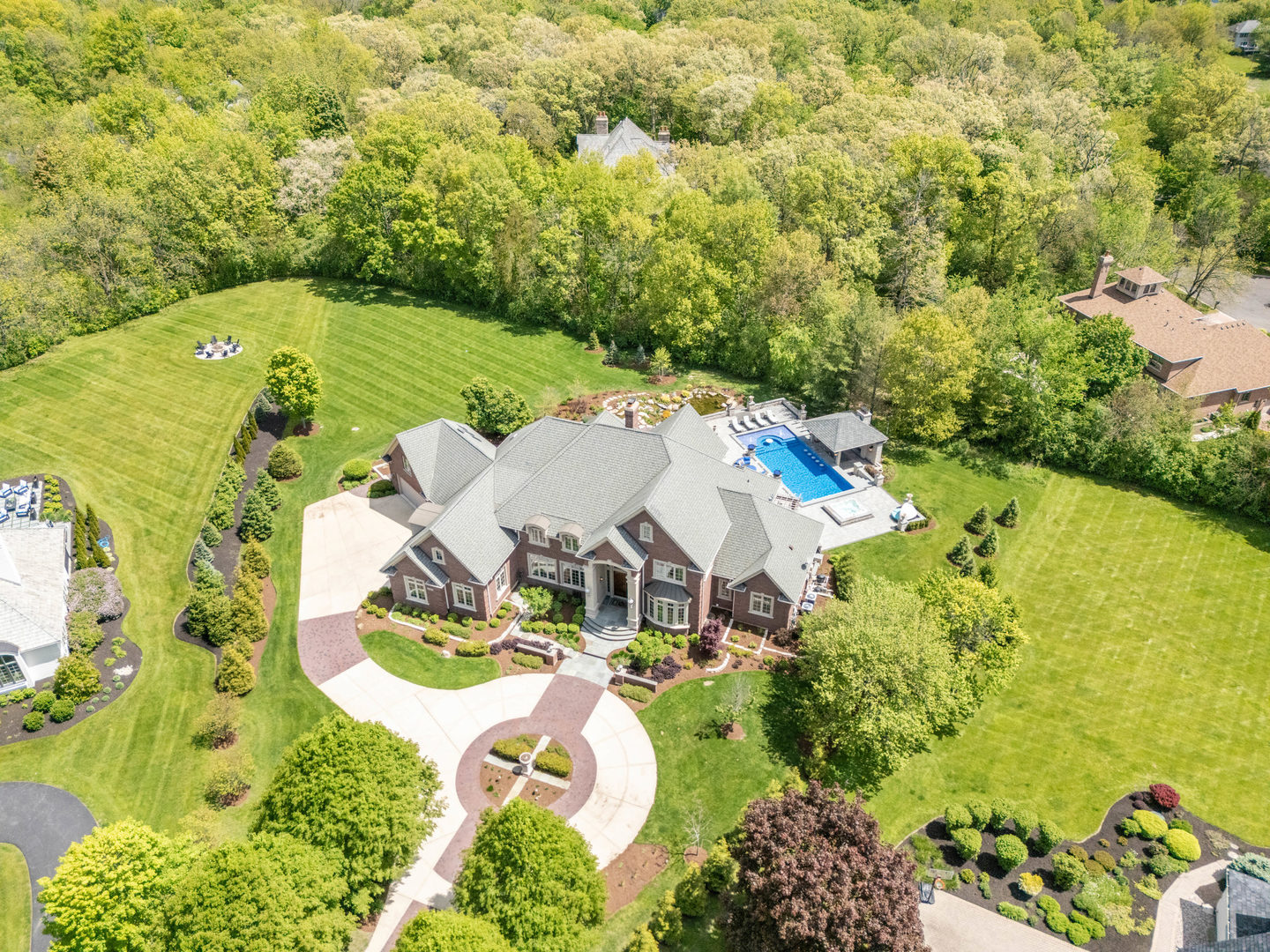 4N881 Old Farm Road St. Charles, IL 60175 - Photo 1 of 66 an aerial view of a house with swimming pool and garden