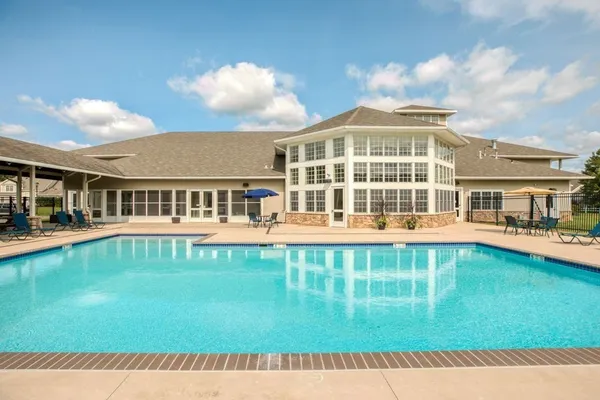 a view of a house with a swimming pool