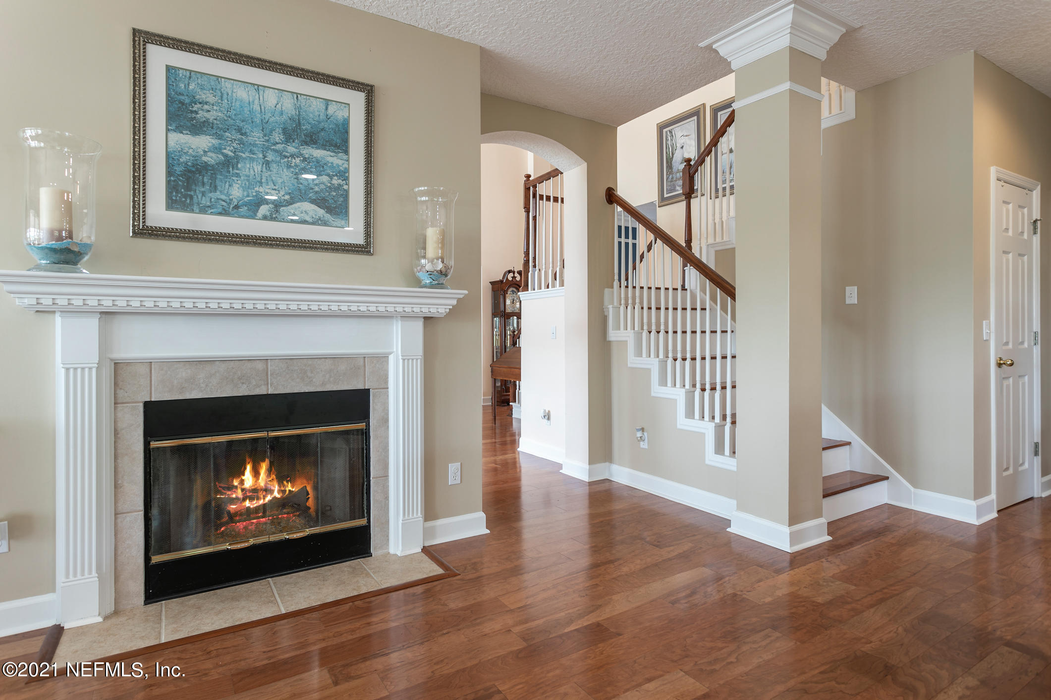 1508 Hackberry Court St. Johns, FL 32259 - Photo 15 of 47 a living room with a fireplace with a fireplace