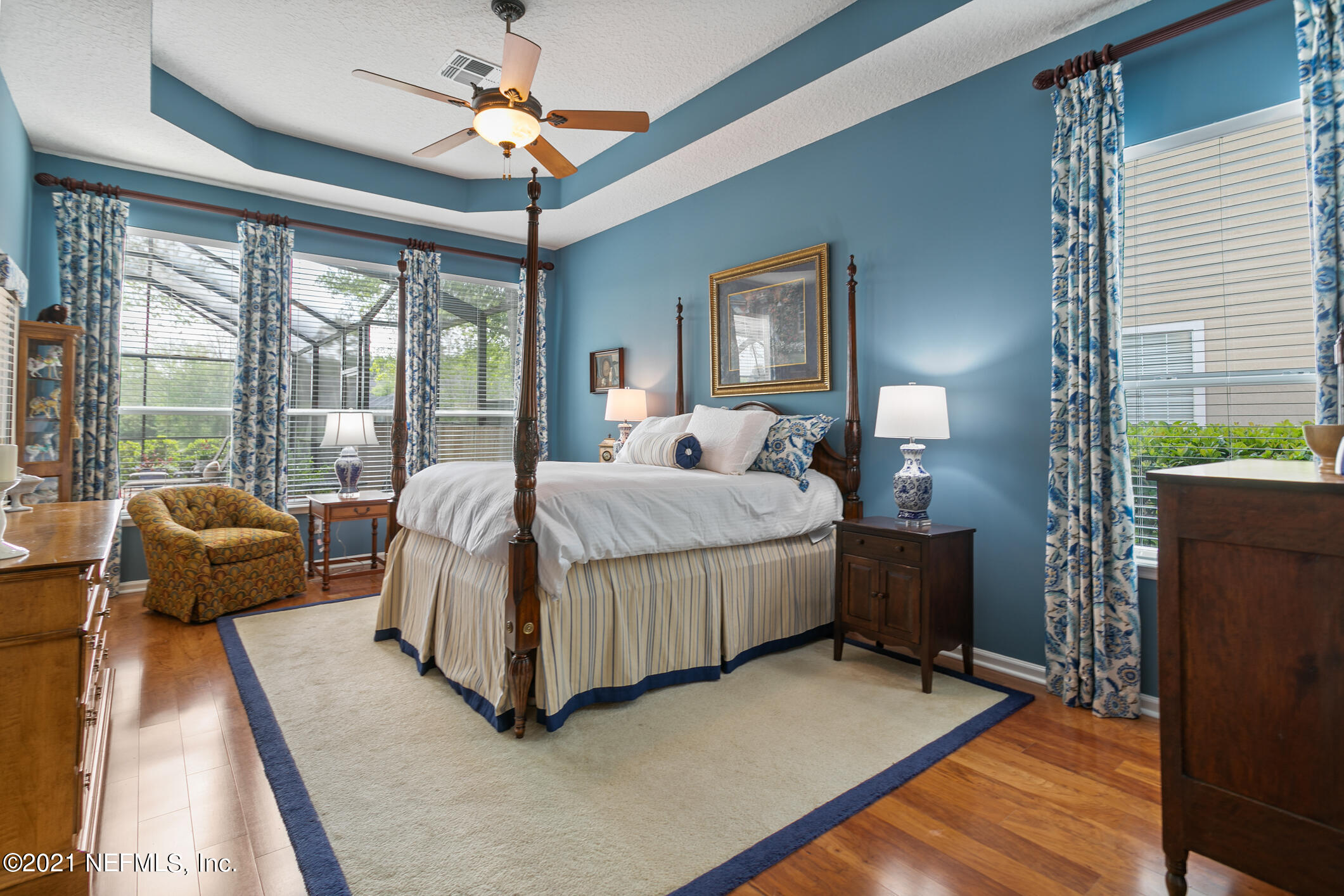 1508 Hackberry Court St. Johns, FL 32259 - Photo 16 of 47 a bedroom with bed and glass door