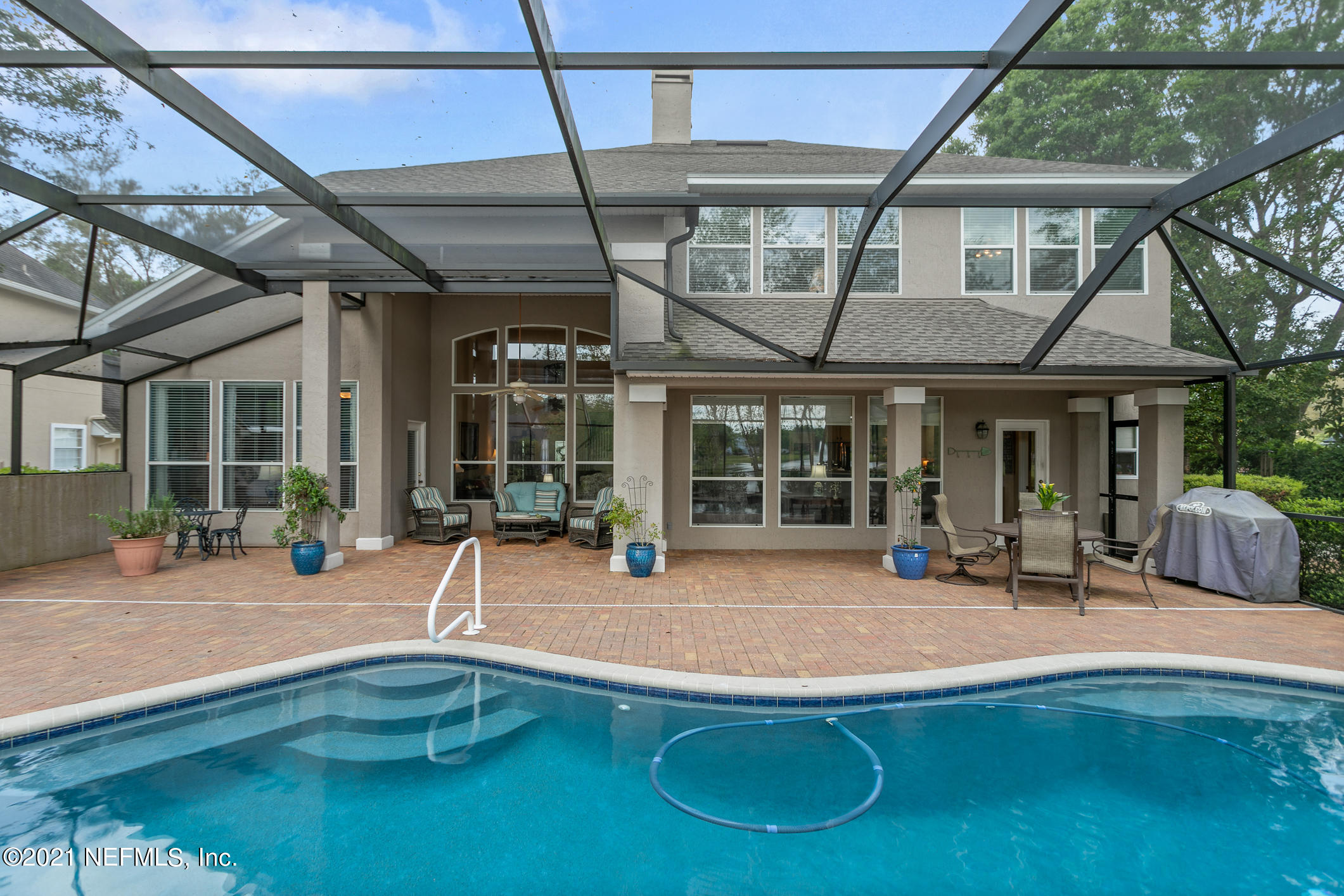1508 Hackberry Court St. Johns, FL 32259 - Photo 35 of 47 a swimming pool with patio outdoor seating and yard