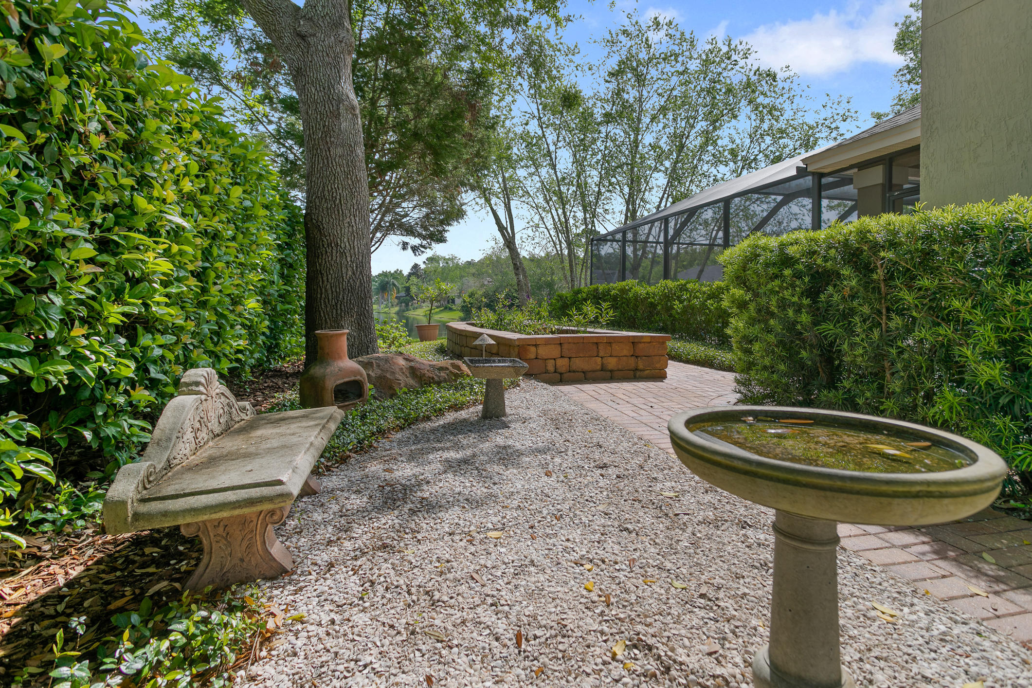 1508 Hackberry Court St. Johns, FL 32259 - Photo 39 of 47 a backyard of a house with fountain table and chairs