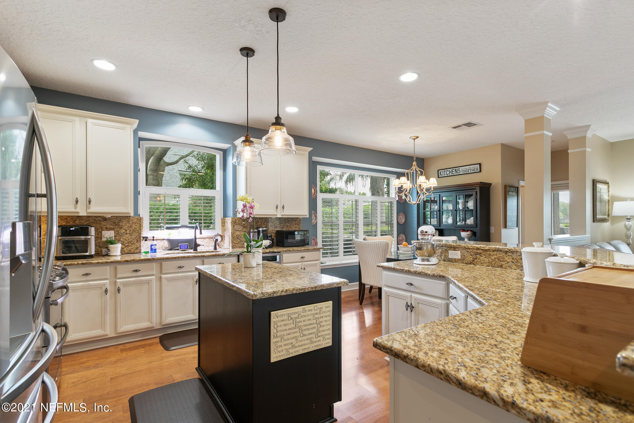 1508 Hackberry Court St. Johns, FL 32259 - Photo 10 of 47 a kitchen with counter top space appliances and windows
