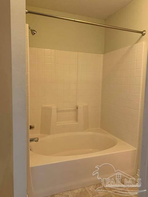 5466 Cherub Circle Milton, FL 32583 - Photo 10 of 13 a bathroom with a shower and a glass door